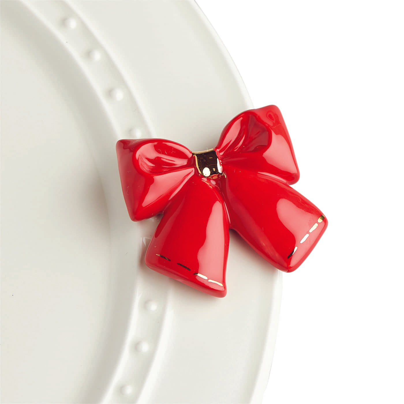 Nora fleming mini mini figure ceramic minis gift present bow red bow "wrap it up" christmas christmastime winter presents deck the halls festive